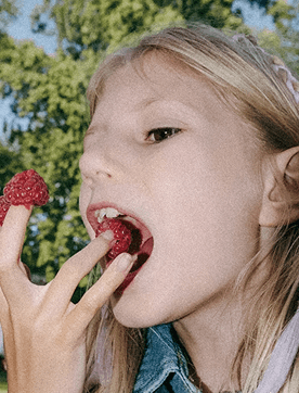 Child eating fruit